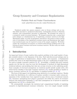 Group Symmetry and Covariance Regularization