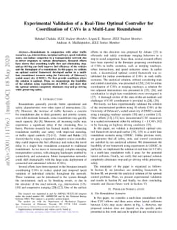 Experimental Validation of a Real-Time Optimal Controller for
  Coordination of CAVs in a Multi-Lane Roundabout