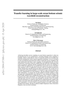 Transfer learning in large-scale ocean bottom seismic wavefield
  reconstruction
